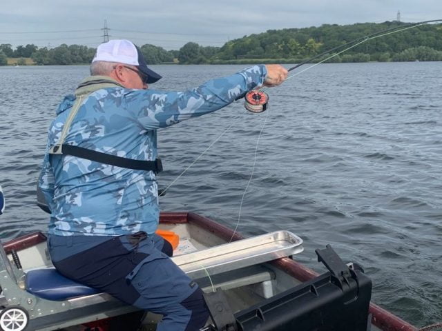 jim crawford playing a fish