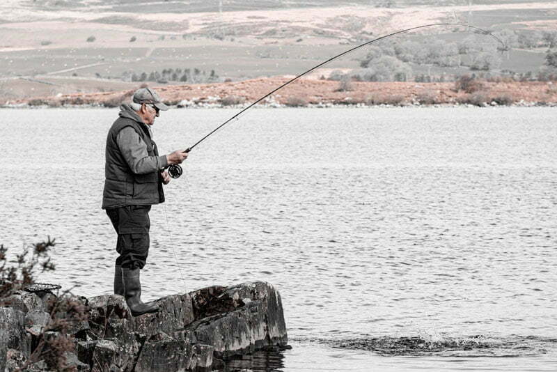 Man fly fishing Llyn Trawsfynydd