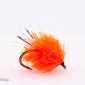 fluorescent orange blob with sparkler tail scaled